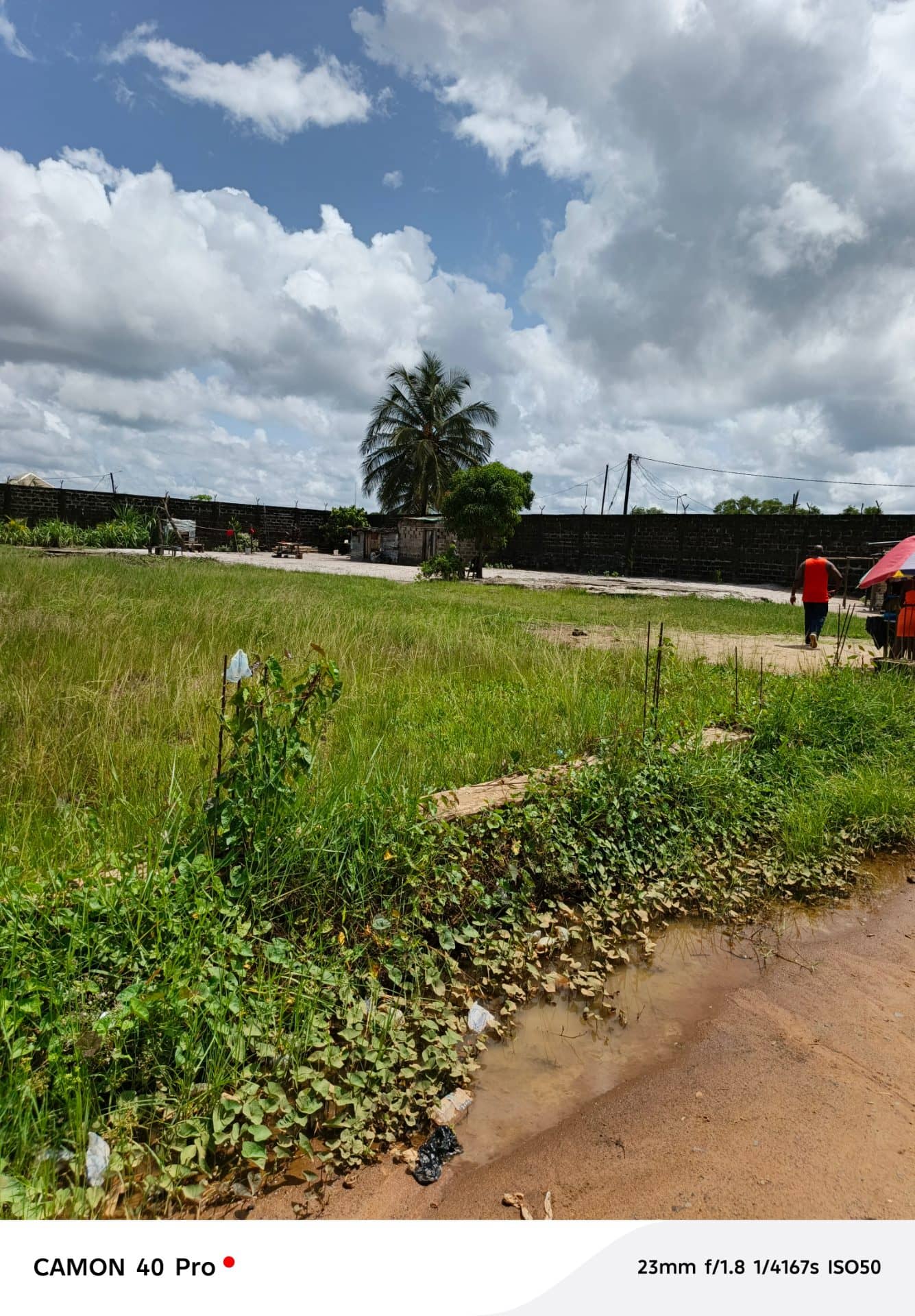 1 ACRE OF BEAUTIFUL FRONT VIEW LAND FOR SALE RIA HIGHWAY TRANSIT COMMUNITY OPPOSITE THE ARMY BARRACKS